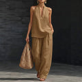 Big size suit with V-neck and strap around the neck